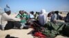 Dozens Injured During Refugee Protests in Libyan Detention Center