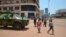 An armoured vehicle of of the Congolese army, part of the Central African Multinational Force is parked in front of a bank in central Bangui on April 3, 2013. 