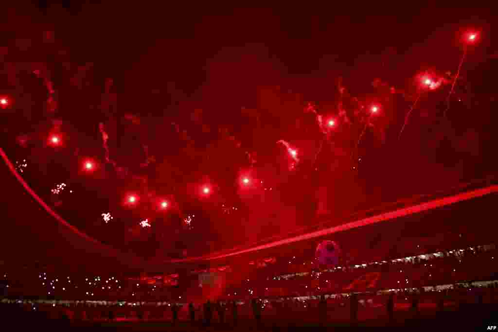 Fireworks light the sky during the opening ceremony of the Arab Club Championship football match between Saudi Arabia&#39;s al-Hilal and Tunisia&#39;s Etoile Du Sahel at the Hazza Bin Zayed Stadium in the Emirates city of al Ain on April 18, 2019.