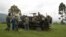 Congolese government soldiers prepare to drive from a military outpost between Kachiru village and Mbuzi hill, in eastern Democratic Republic of the Congo, May 25, 2012.