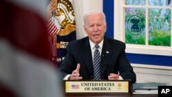 FILE - President Joe Biden participates virtually in the U.S.-ASEAN Summit from the South Court Auditorium on the White House complex in Washington, Tuesday, Oct. 26, 2021. 