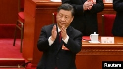 2023年3月13日中国国家主席习近平在全国人民代表大会闭幕式鼓掌