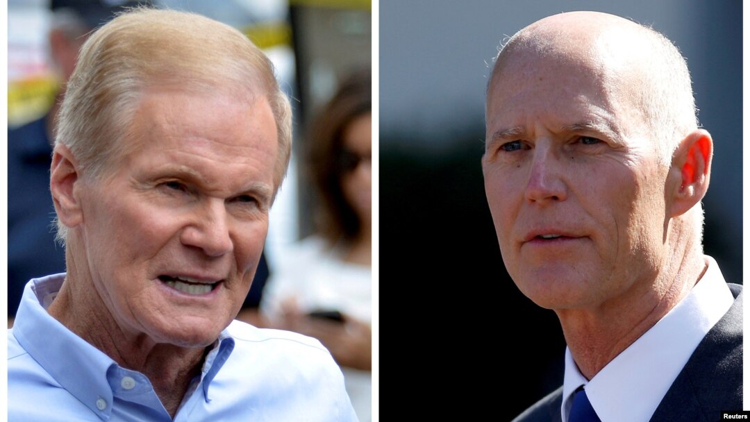 Senator Bill Nelson (kiri) bersaing ketat dengan Rick Scott dalam pemilihan Senator untuk negara bagian Florida. 