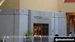 FILE - Shoppers exit a Tiffany & Co. store in California. (Photo: Dia Bekheet). French luxury group LVMH has offered to buy Tiffany & Co. for $14.5 billion in cash.
