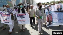 In this file photo, former Afghan interpreters, who worked with U.S. troops in Afghanistan, demonstrate in front of the U.S. embassy in Kabul June 25, 2021. (REUTERS/Stringer/File Photo)