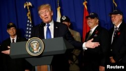 U.S. President Donald Trump delivers remarks before signing a proclamation commemorating the 50th anniversary of the Vietnam War during an event with U.S. military veterans in Danang, Vietnam, Nov. 10, 2017.