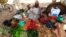 A street vendor waits for customers in Khartoum, Sudan, Dec. 2, 2016. If African countries want to be able to feed a quickly increasing population, leaders need to start planning now, according to a report in the Proceedings of the National Academy of Sciences.