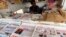 The al-Intibaha newspaper is seen on display with other newspaper titles at a newsstand in Khartoum, Nov. 10, 2012. 