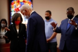 Democratic presidential candidate, former Vice President Joe Biden bows his head in prayer during a visit to Bethel AME Church in Wilmington, Del., June 1, 2020.