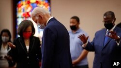 Democratic presidential candidate, former Vice President Joe Biden bows his head in prayer during a visit to Bethel AME Church in Wilmington, Del., June 1, 2020. 