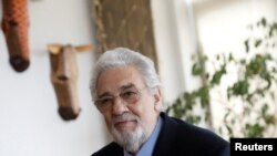 FILE - Opera singer Placido Domingo sits during an event at the Manhattan School of Music in New York, May 11, 2018. 