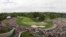 View from the newly built clock tower shows Tiger Woods putting on the 18th hole during the final round of the Memorial golf tournament, Dublin, Ohio, June 2, 2013.