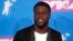 FILE - Kevin Hart arrives at the 2018 MTV Video Music Awards at Radio City Music Hall, New York, Aug. 20, 2018.