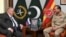 Russian Deputy Prime Minister Alexei Overchuk, left, meets with Pakistan's Army Chief Gen. Asim Munir, in Rawalpindi, Pakistan, Sept. 18, 2024. (Inter Services Public Relations via AP)