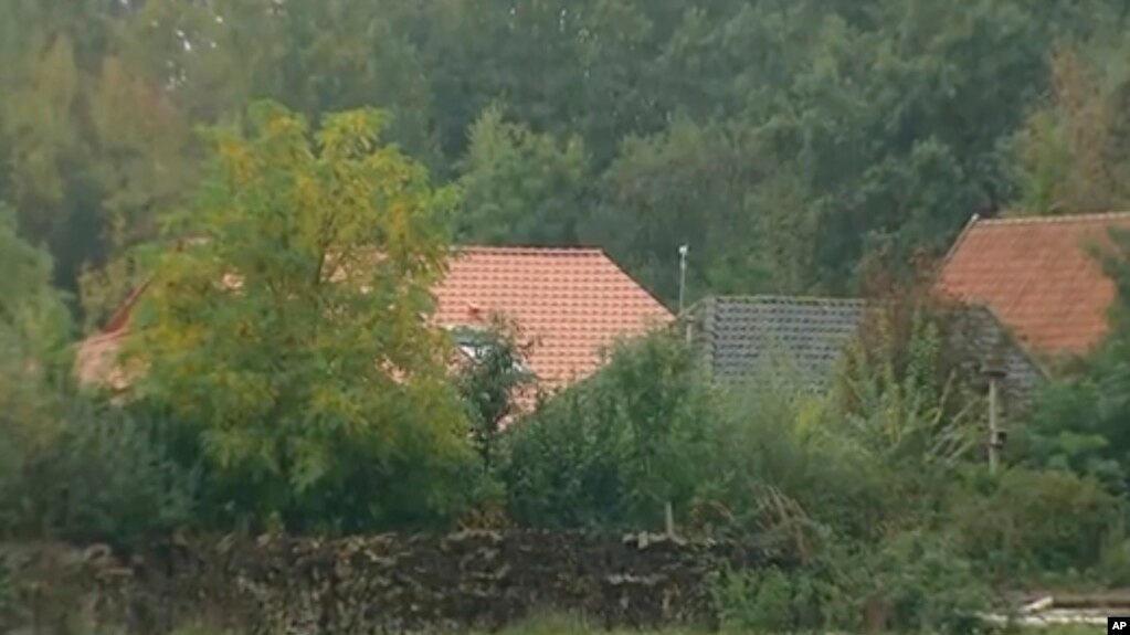 Several buildings are seen where a group of people were discovered to be living in secluded conditions, in Ruinerwold, 130 kilometers (80 miles) northeast of Amsterdam, Netherlands, Oct. 15, 2019. 