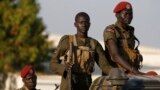 FILE - SPLA soldiers stand in a vehicle in Juba, Dec. 20, 2013. The Sudan People's Liberation Army is accused of attacking civilians over the weekend. A spokesman denies the allegations.