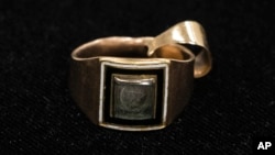Shown is Alexander Hamilton's widow Elizabeth Hamilton's gold mourning ring with a piece of her late-husband's hair encased under the glass jewel, at the Museum of the American Revolution in Philadelphia, Nov. 12, 2018. 