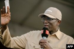 FILE —Former Prime minister Amadou Ba, candidate for outgoing president's Alliance For the Republic party (APR), addresses a campaign meeting ahead of Senegal's Presidential elections in Diourbel on March 19, 2024.