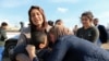 Relatives hug a Yazidi survivor boy following his release from Islamic State militants in Syria, in Duhok, Iraq, March 2, 2019. 