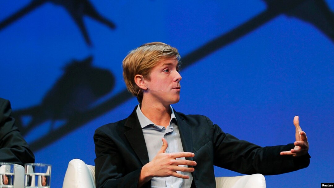 FILE -Chris Hughes, co-founder of Facebook, speaks at a conference in Boston, Massachusetts.