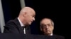 ILE - In this Wednesday, June 5, 2019 file photo, FIFA President Gianni Infantino, left, speaks with French Football Federation President Noel Le Graet before the start of the 69th FIFA congress in Paris. 