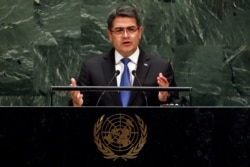 Honduras President Juan Orlando Hernandez Alvarado addresses the 74th session of the U.N. General Assembly, Sept. 25, 2019.