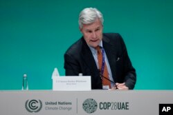 FILE - Senate Budget Committee Chairman Sheldon Whitehouse, D-R.I., speaks during a meeting at the COP28 U.N. Climate Summit, December 10, 2023, in Dubai, UAE.