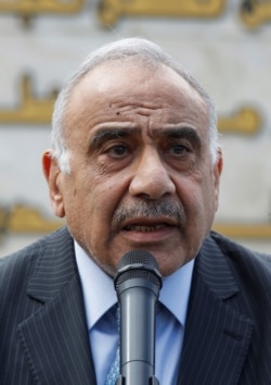 FILE - Iraqi Prime Minister Adel Abdul-Mahdi speaks in Baghdad, Oct. 23, 2019.