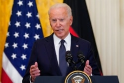FILE - President Joe Biden speaks during a news conference with German Chancellor Angela Merkel in the East Room of the White House in Washington, July 15, 2021.