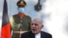 FILE - Afghan President Ashraf Ghani speaks during a joint news conference with Pakistan Prime Minister Imran Khan at the Presidential Palace in Kabul, Afghanistan, Nov. 19, 2020.