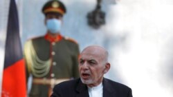 FILE - Afghan President Ashraf Ghani speaks during a news conference at the Presidential Palace in Kabul, Afghanistan, Nov. 19, 2020.