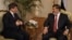 FILE - Former Egyptian President Mohamed Morsi (R) meets with Turkey's Foreign Minister Ahmet Davutoglu at the presidential palace in Cairo, Sept. 17, 2012. 