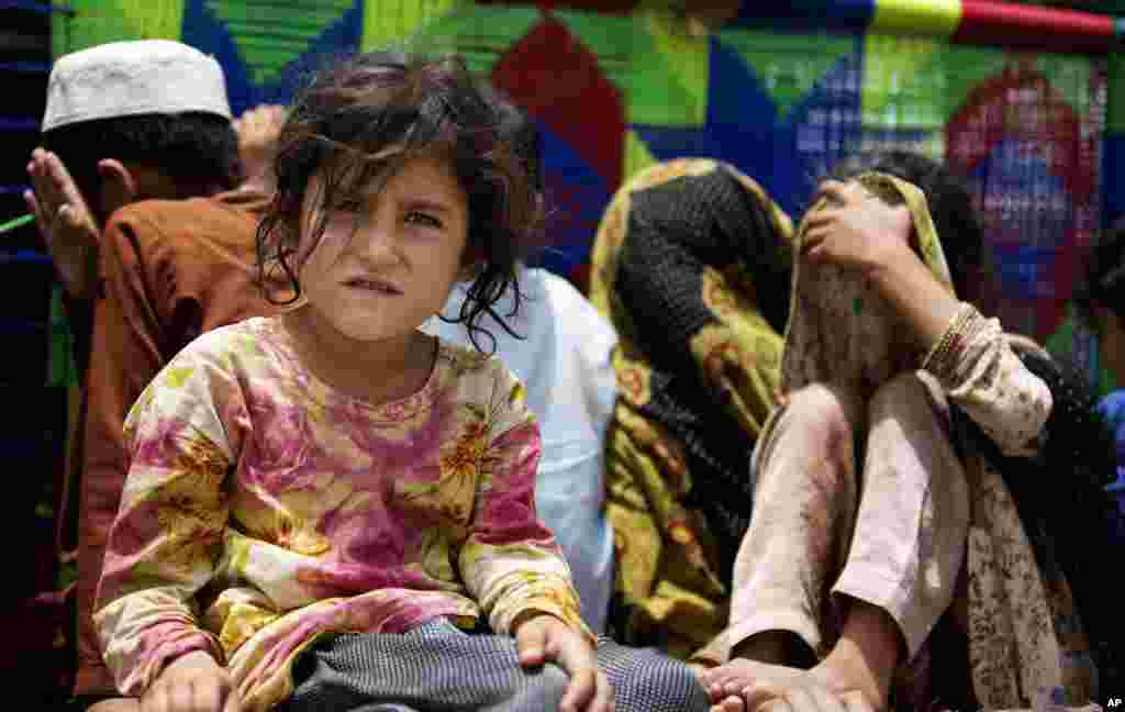 Pakistani jets pounded targets in the country's northwest in a major offensive designed to root out terrorist safe havens in the region forcing families to flee their villages, Bannu, Pakistan, June 17, 2014.