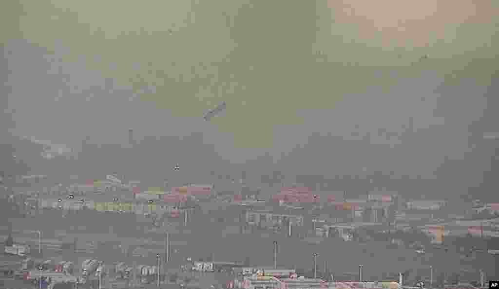 A trailer flies through the air in this still image taken from video. (Reuters TV/NBC)