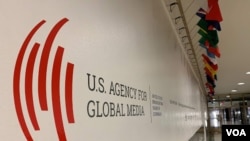 FILE - The U.S. Agency for Global Media logo is seen near the entrance foyer at the Voice of America building, in Washington, D.C., Nov. 22, 2019. The Open Technology Fund is one of USAGM's constituent entitites.