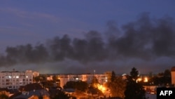 Black smoke billows over the city after drone strikes in the western Ukrainian city of Lviv on September 19, 2023, amid Russia's military invasion on Ukraine.