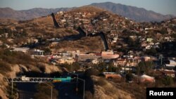 FILE - The U.S. border with Mexico is seen in Nogales, Arizona, U.S., January 31, 2017. 