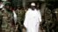 FILE - Gambian President Yahya Jammeh, center, leaves a central Banjul polling station in Banjul, Gambia, Sept. 22, 2006. 