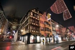 Christmas lightings are pictured where the Christmas market usually takes place, Nov.27, 2020, in Strasbourg, eastern France. Due to the COVID-19 pandemic, the well-known festive market will not be taking place this year.