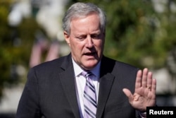 FILE - White House Chief of Staff Mark Meadows speaks to the media in Washington, Oct. 2, 2020.