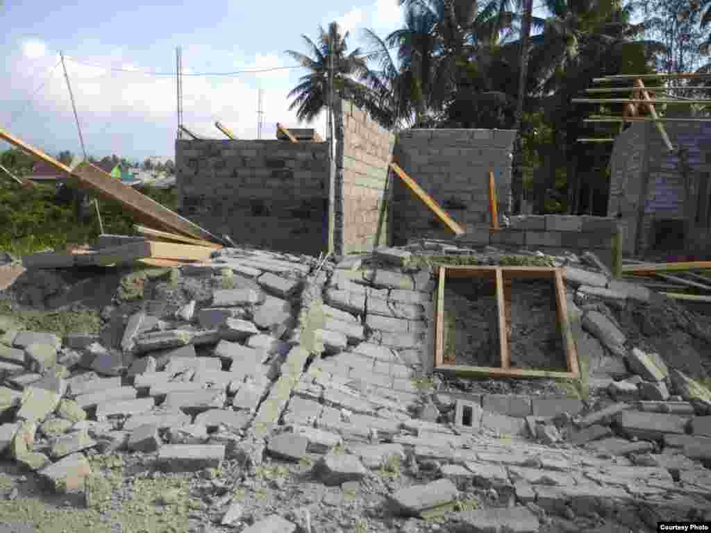 Some of the wreckage left in Donggala, central Sulawesi, Indonesia, after a 7.5 magnitude earthquake, Sept. 28, 2018. (BNPB photo)