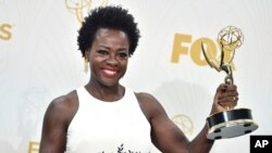 FILE - Viola Davis poses in the press room with the award for outstanding lead actress in a drama series for “How to Get Away With Murder” at the 67th Primetime Emmy Awards in Los Angeles, California, Sept. 20, 2015.