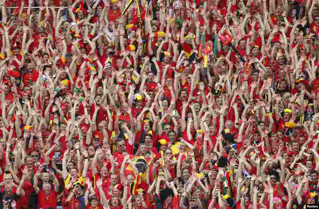 Belgian fans wave during their 2014 World Cup Group H soccer match against Russia at Maracana stadium in Rio de Janeiro June 22, 2014.