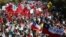 FILE - Demonstrators take part in a protest against national pension system in Valparaiso, Chile, March 26, 2017. 