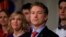 FILE - Republican presidential candidate, Sen. Rand Paul, R-Ky, stands with his wife, Kelley, as he waits to speaks to supporters during a caucus night party at the Scottish Rite Consistory in Des Moines, Iowa, Feb. 1, 2016.