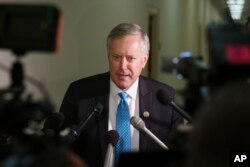 FILE - Rep. Mark Meadows, R-N.C., speaks to reporters on Capitol Hill in Washington, Oct. 25, 2018.