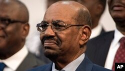 FILE - Sudanese President Omar al-Bashir is seen during the opening session of the AU summit in Johannesburg, June 14, 2015. 