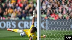 Nigeria's goalkeeper #16 Chiamaka Nnadozie saves a penalty kick by Canada during the Australia and New Zealand 2023 Women's World Cup Group B football match between Nigeria and Canada at Melbourne Rectangular Stadium, also known as AAMI Park, in Melbourne on July 21, 2023.