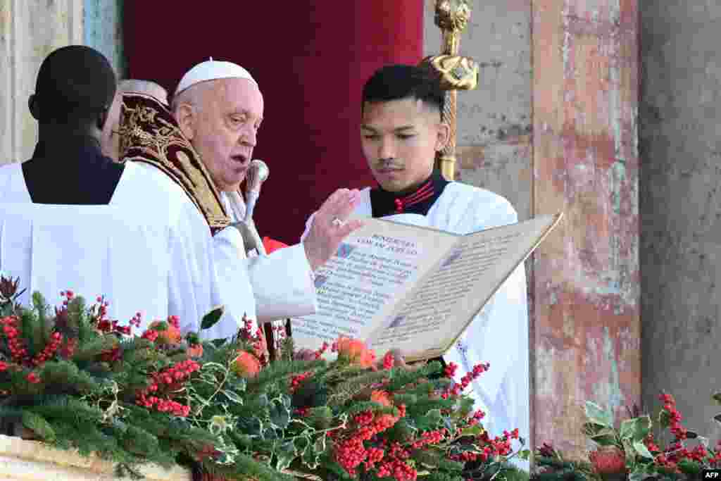 Pope Francis delivers the Urbi et Orbi message and blessing to the city and the world from the main balcony of St. Peter&#39;s basilica as part of Christmas celebrations, at St. Peter&#39;s square in the Vatican, Dec. 25, 2024.