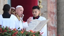 Pope Francis delivers the Urbi et Orbi message and blessing to the city and the world from the main balcony of St. Peter&#39;s basilica as part of Christmas celebrations, at St. Peter&#39;s square in the Vatican, Dec. 25, 2024.